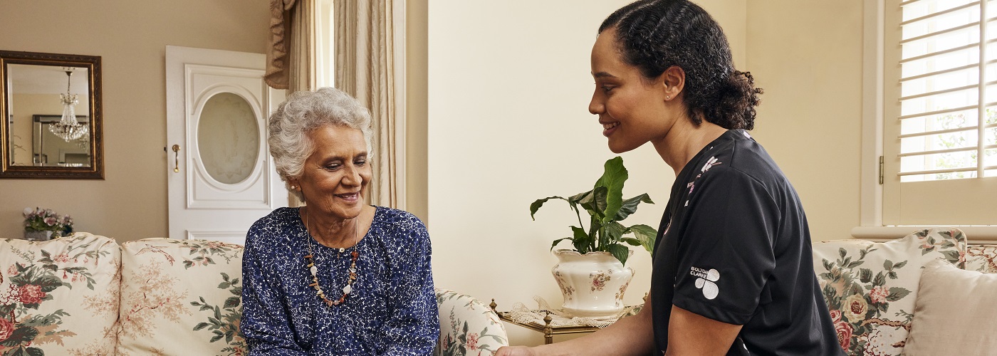 Nurse and client at client's home