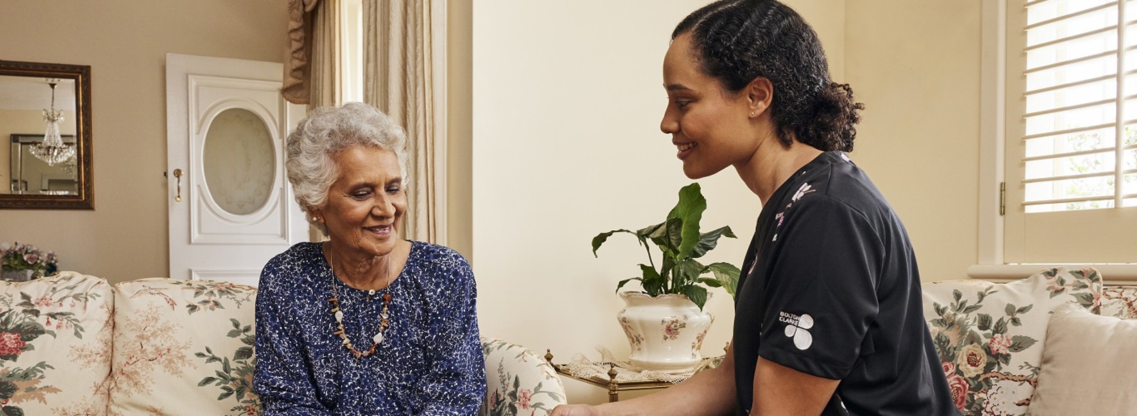 Nurse and client at client's home Nurse and client at client's home