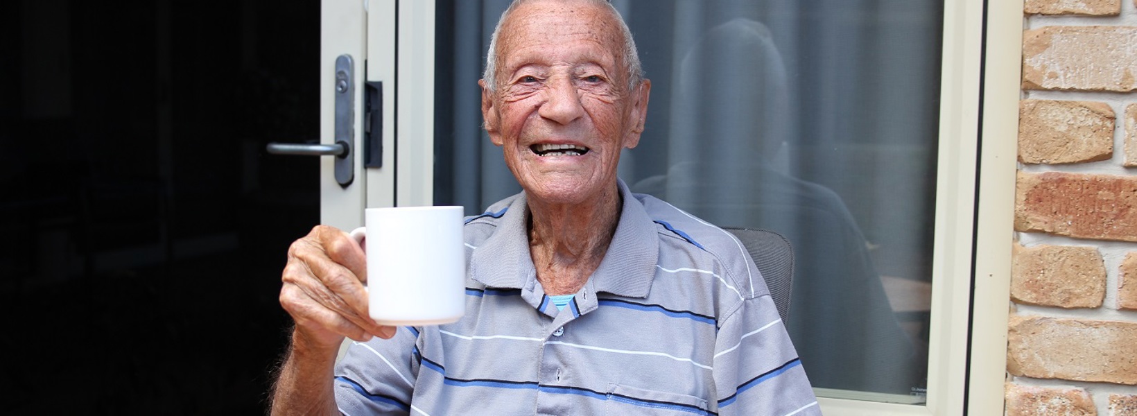 Centenarian George enjoying a cup of tea Centenarian George enjoying a cup of tea
