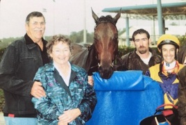 Neil and Patricia with their winning racehorse Neil and Patricia with their winning racehorse