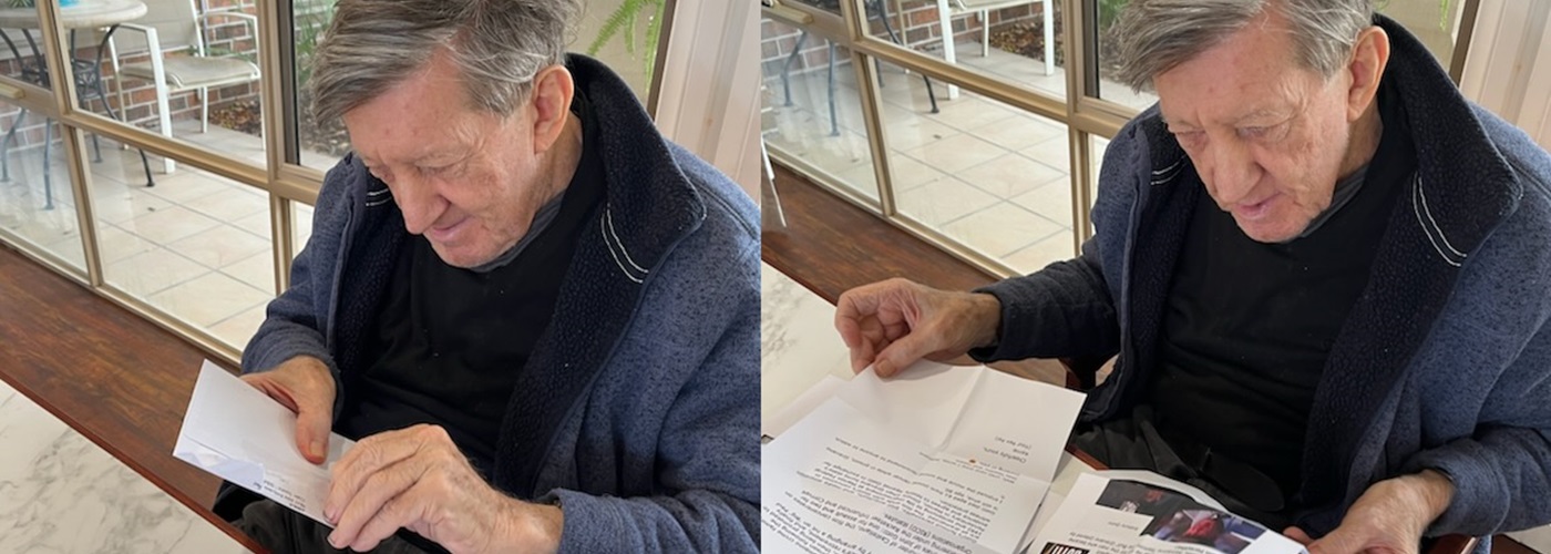 Residents opening their letters.jpg