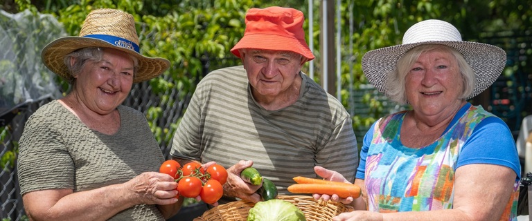 Rowes Bay residents in the community garden Rowes Bay residents in the community garden