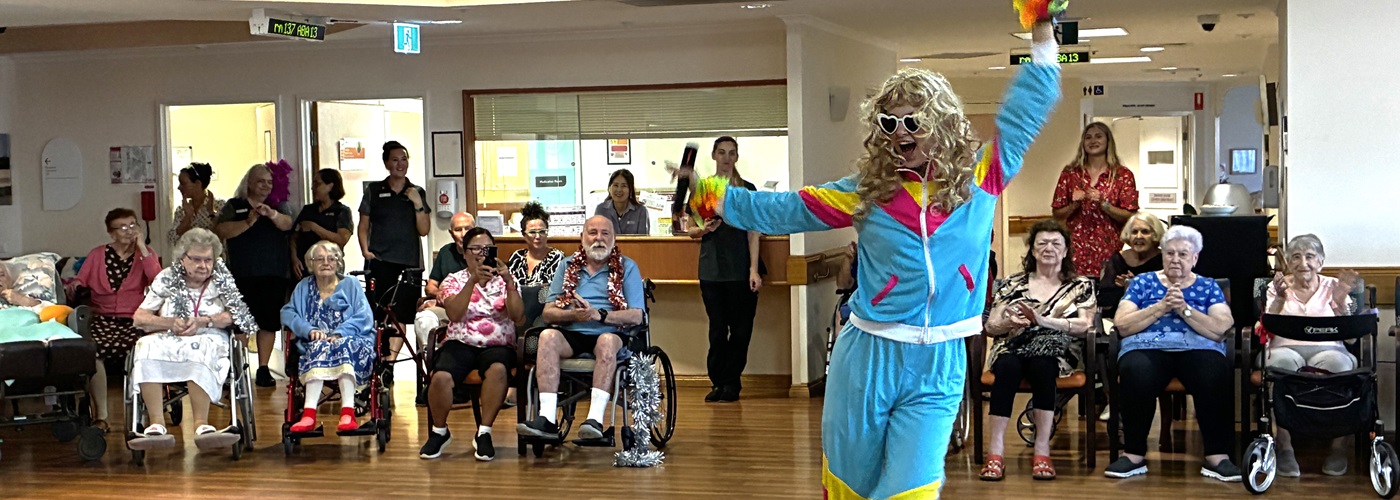 Team members performing for residents.jpg