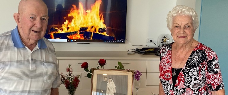 Celebrating their wedding anniversary together Celebrating their wedding anniversary together